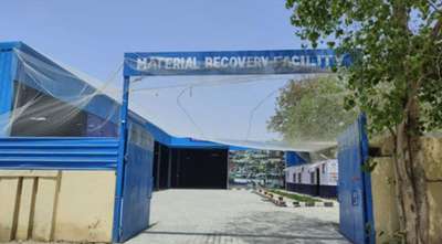 Entrance gate of material recovery facility building