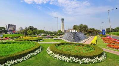 Airport garden with flowers and control tower view