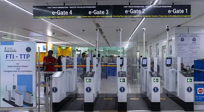 Automated immigration e-gates in an airport terminal for trusted travelers.