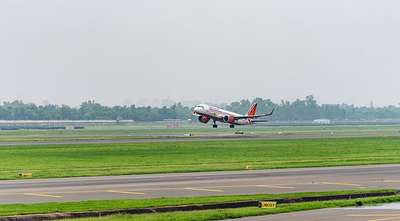 Airplane taking off from airport runway