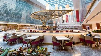 Modern airport lounge dining area with large seating space